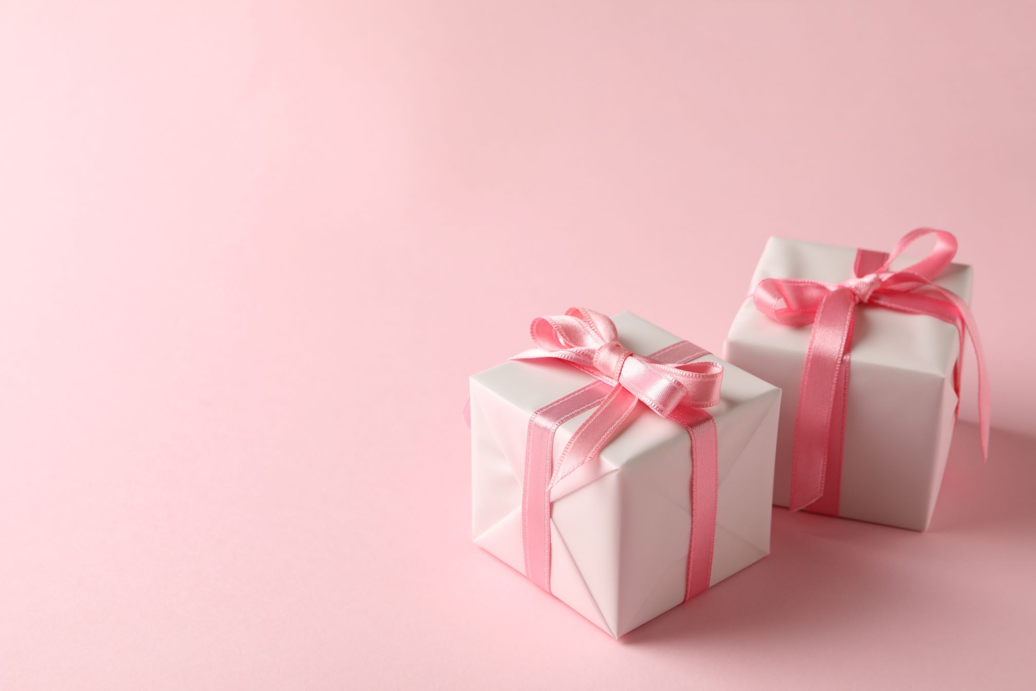 gift-boxes-on-pink-background
